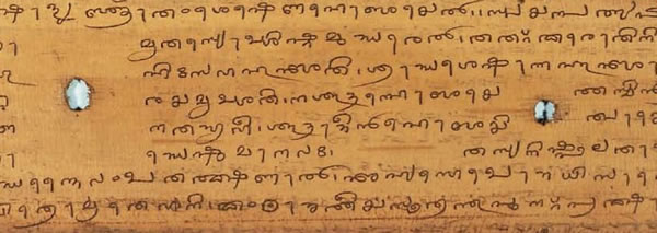 Sample text in the Tigalari script