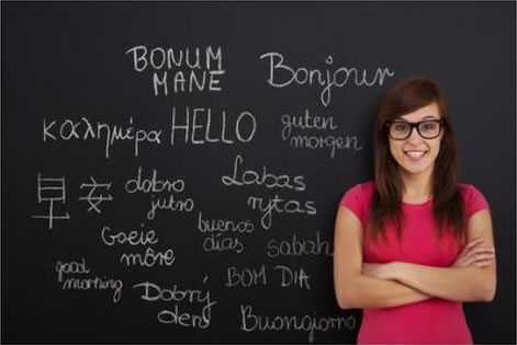Blackboard with various languages writing on it, courtesy of Shutterstock